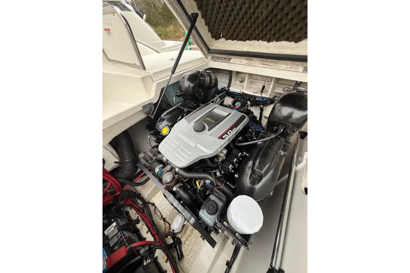 Slide: The Image of Engine compartment of a 2012 Sea Ray 240 Sundeck boat. - 29