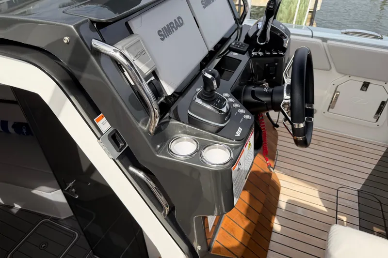 Slide: The Image of 2023 Schaefer V33 boat helm with Simrad electronics and joystick controls. - 8