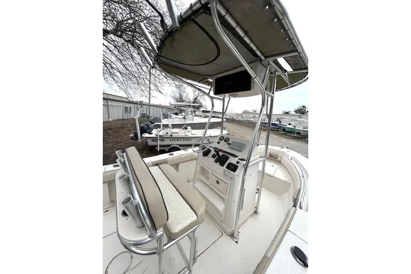 Slide: The Image of 2015 Sea Chaser 20 HFC boat interior with helm and seating area. - 3