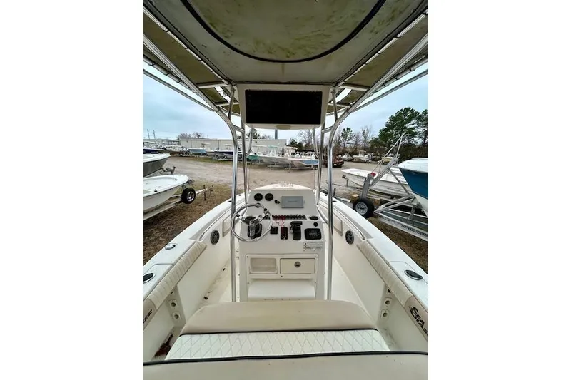 Slide: The Image of 2015 Sea Chaser 20 HFC boat interior with steering console and seating. - 5