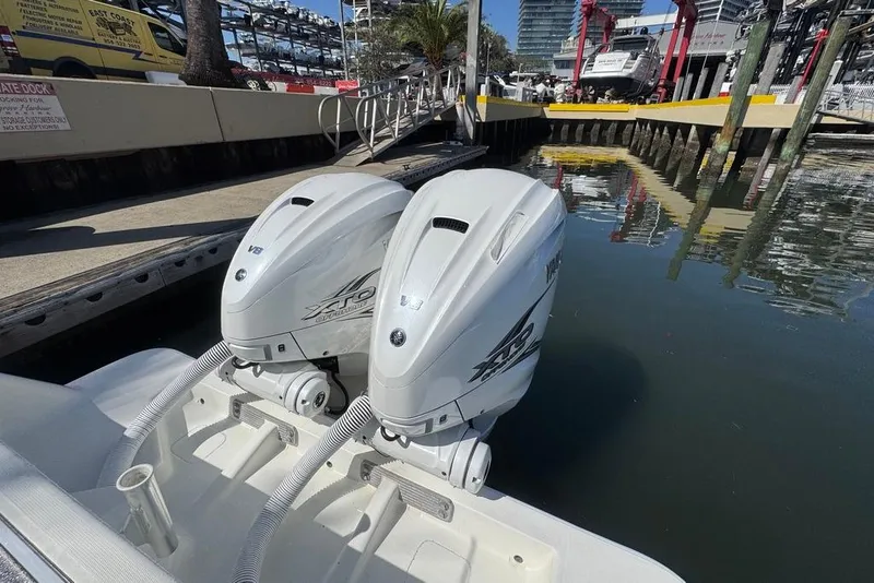 Slide: The Image of 2014 SeaVee 340B Open with twin Yamaha outboard engines docked at marina. - 5