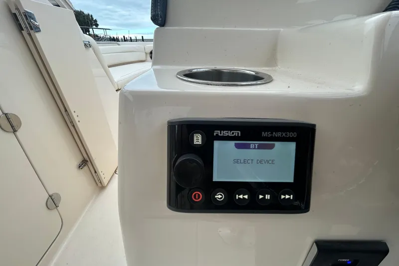 Slide: The Image of 2022 Grady-White Freedom 235 boat interior with Fusion MS-NRX300 audio system. - 15