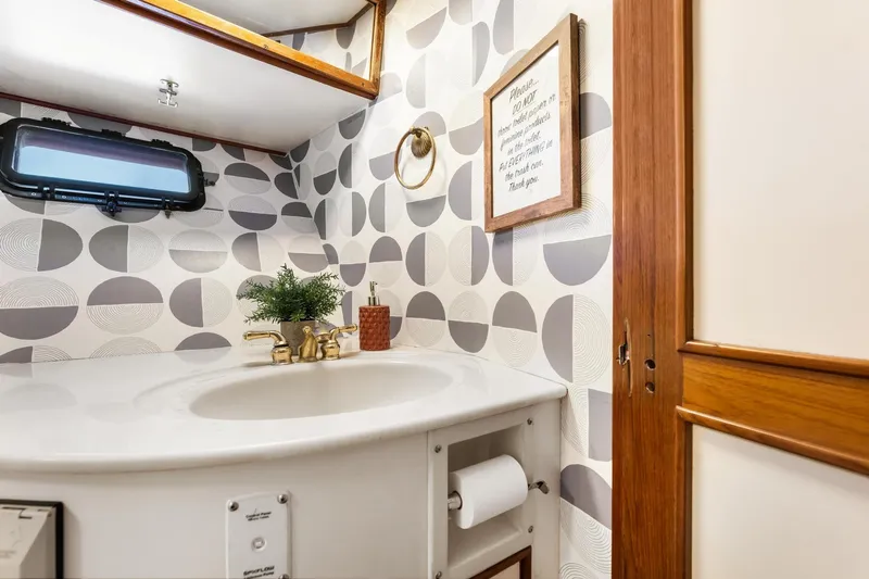Slide: The Image of Elegant 1988 Marine Trader Trawler bathroom with modern decor and stylish fixtures. - 42