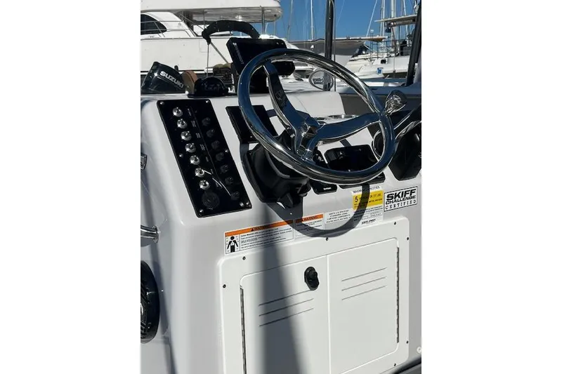 Slide: The Image of 2026 Sea Pro 172 Bay boat console with steering wheel and control panel. - 11