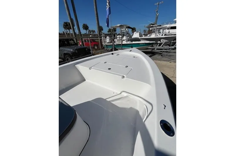 Slide: The Image of 2026 Sea Pro 172 Bay boat, white deck, outdoor display, sunny day. - 8