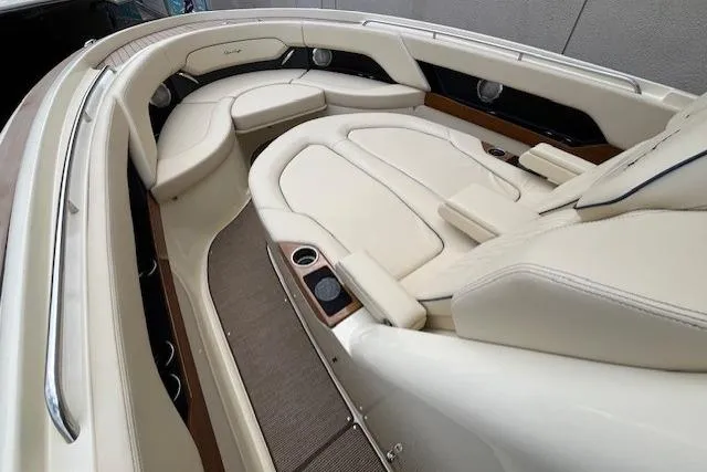Slide: The Image of Luxurious interior of 2026 Chris-Craft Catalina 31 boat with cream leather seating. - 13
