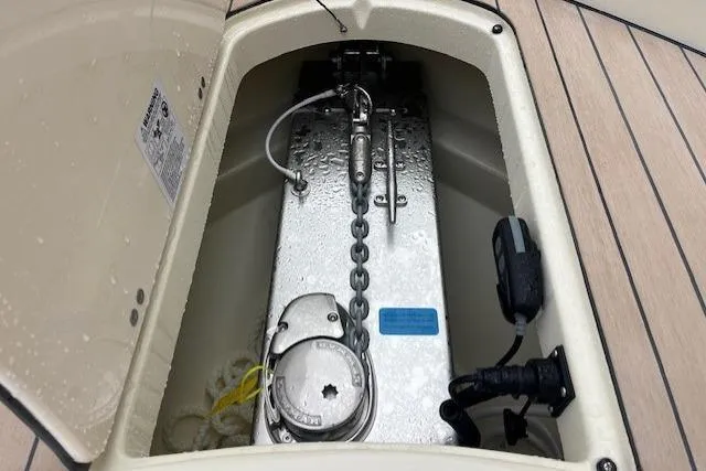 Slide: The Image of Anchor compartment of 2026 Chris-Craft Catalina 31 with chain and winch system. - 27
