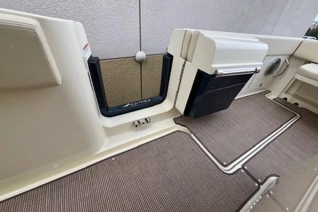 Slide: The Image of 2026 Chris-Craft Catalina 31 boat interior with beige flooring and seating area. - 28