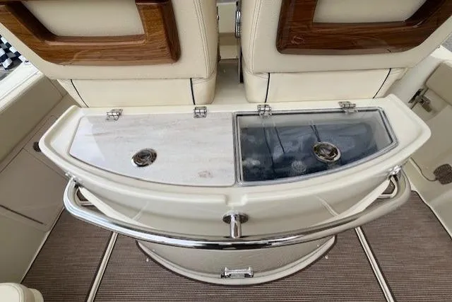 Slide: The Image of 2026 Chris-Craft Catalina 31 boat interior with elegant seating and storage compartments. - 32
