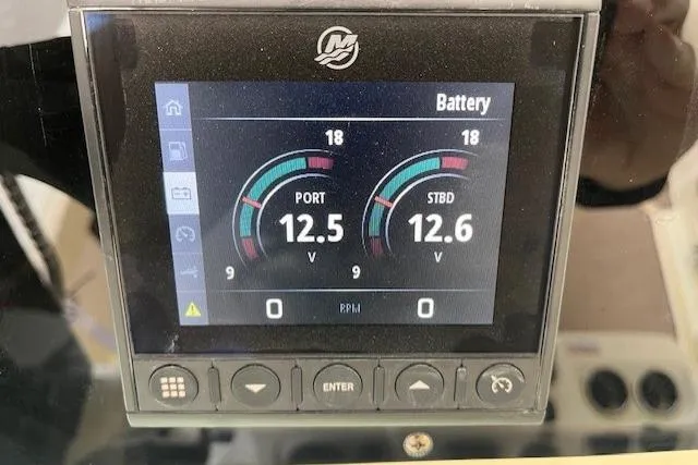 Slide: The Image of Display screen showing battery voltage on 2026 Chris-Craft Catalina 31 boat. - 42