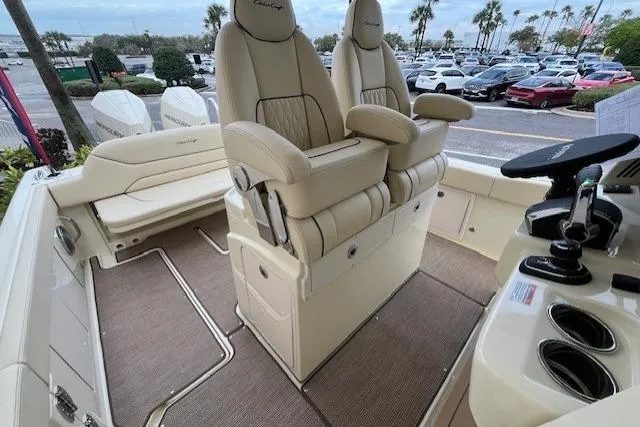 Slide: The Image of 2026 Chris-Craft Catalina 31 boat interior with luxurious seating and modern controls. - 43