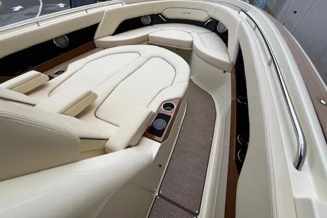 Slide: The Image of Luxurious interior of 2026 Chris-Craft Catalina 31 boat with elegant seating and cup holders. - 9
