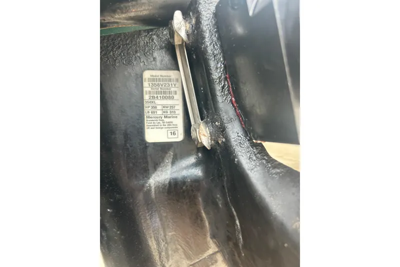 Slide: The Image of Close-up of a 2017 Boston Whaler 320 Vantage engine serial number label. - 56