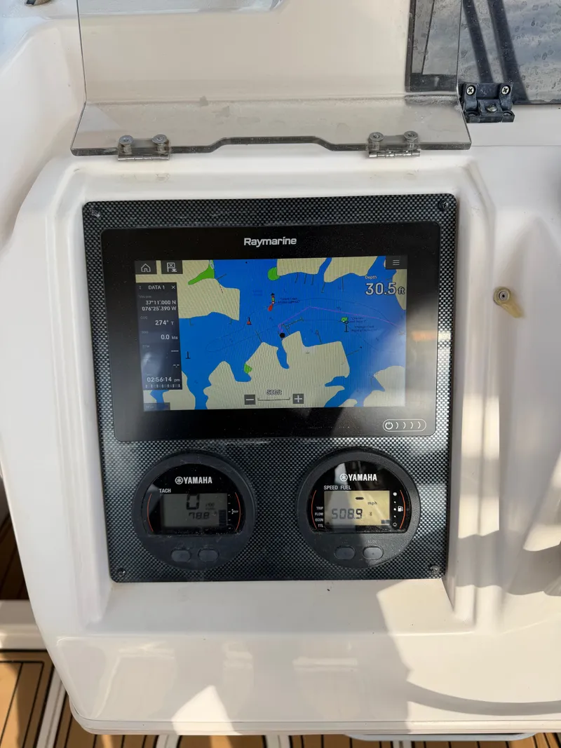 Slide: The Image of Raymarine navigation system on 2001 Grady-White Gulfstream 232 boat. - 10