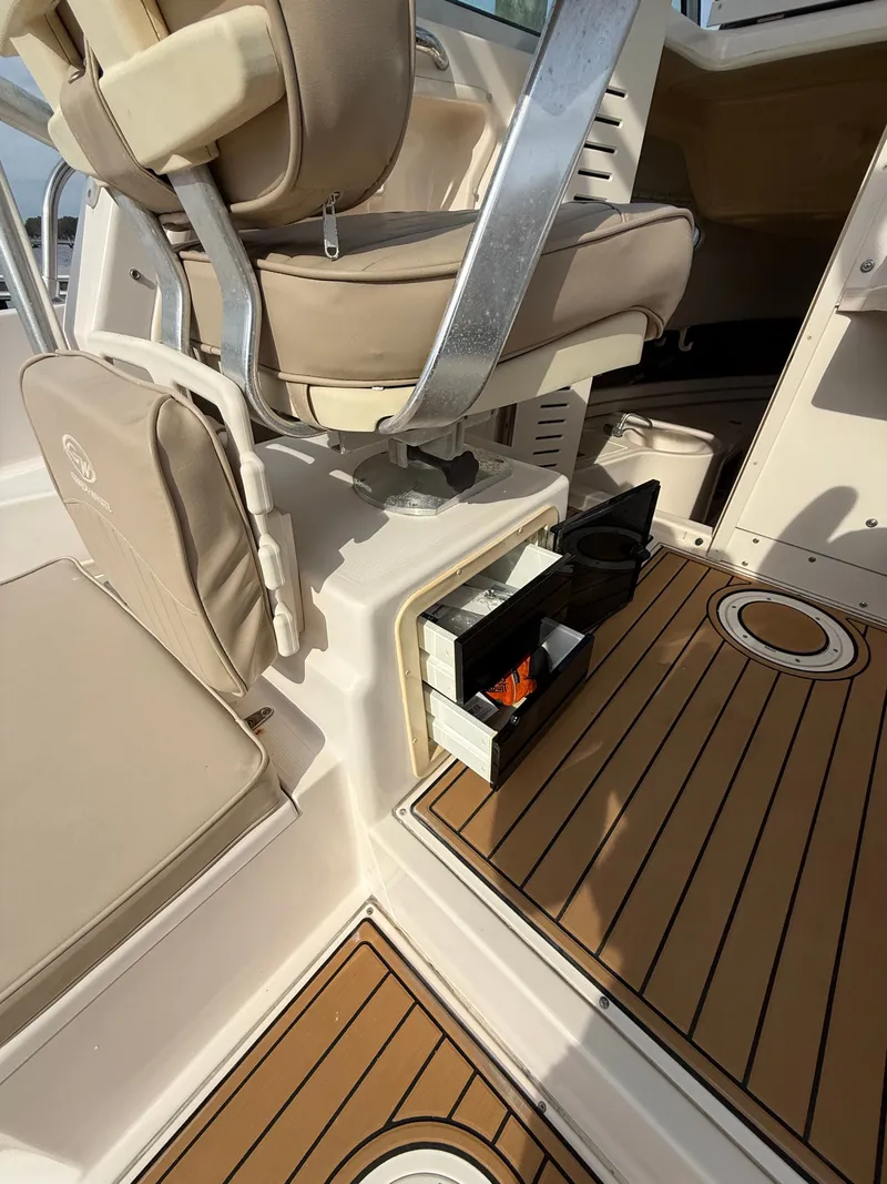 Slide: The Image of Grady-White Gulfstream 232 boat interior with seat and storage. - 20