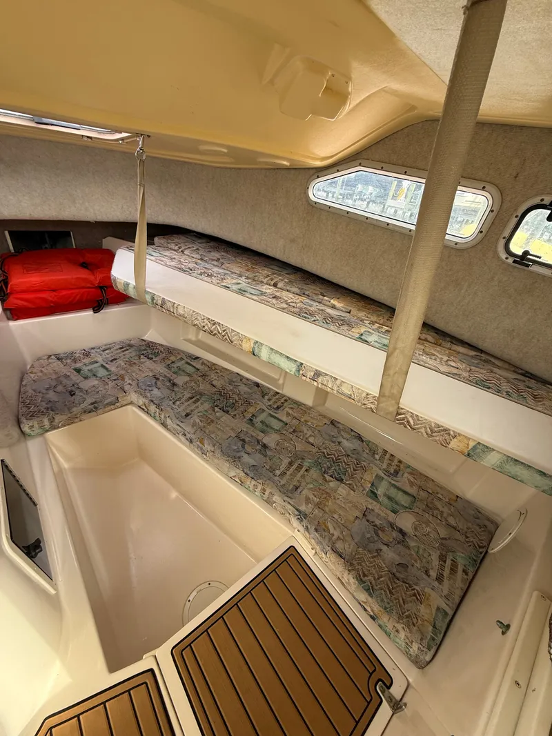 Slide: The Image of Interior of a 2001 Grady-White Gulfstream 232 boat with sleeping area. - 28