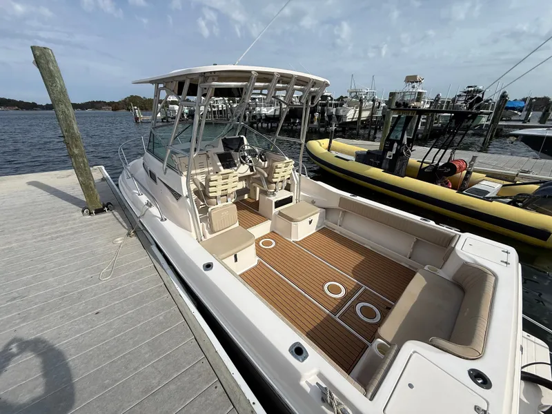 Slide: The Image of 2001 Grady-White Gulfstream 232 boat docked at marina. - 33