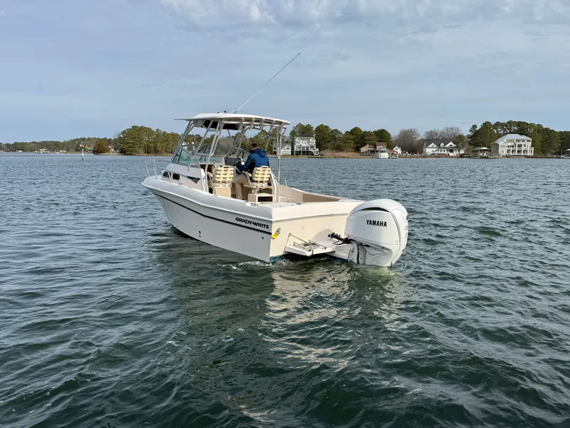 Slide: The Image of 2001 Grady-White Gulfstream 232 boat on calm water. - 4