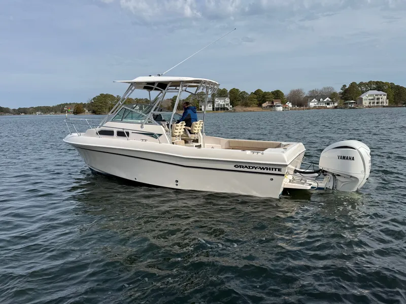 Slide: The Image of 2001 Grady-White Gulfstream 232 boat on calm water. - 5