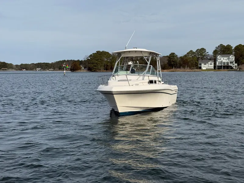 Slide: The Image of 2001 Grady-White Gulfstream 232 boat on calm water. - 8