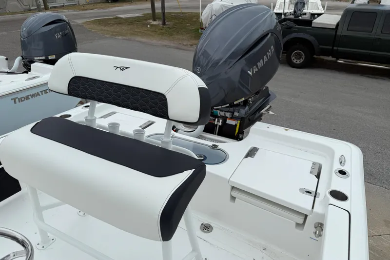Slide: The Image of 2026 Tidewater 1910 Bay Max boat with Yamaha outboard motor, featuring sleek seating design. - 4