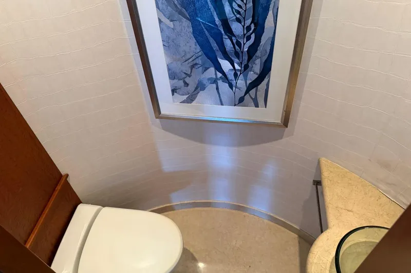 Slide: The Image of Luxury yacht Heesen 144 bathroom with modern decor and framed blue artwork, 1990 model. - 118