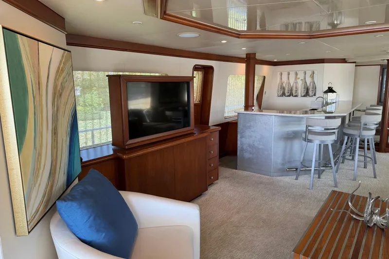 Slide: The Image of Luxurious interior of 1990 Heesen 144 yacht with modern bar and elegant decor. - 15