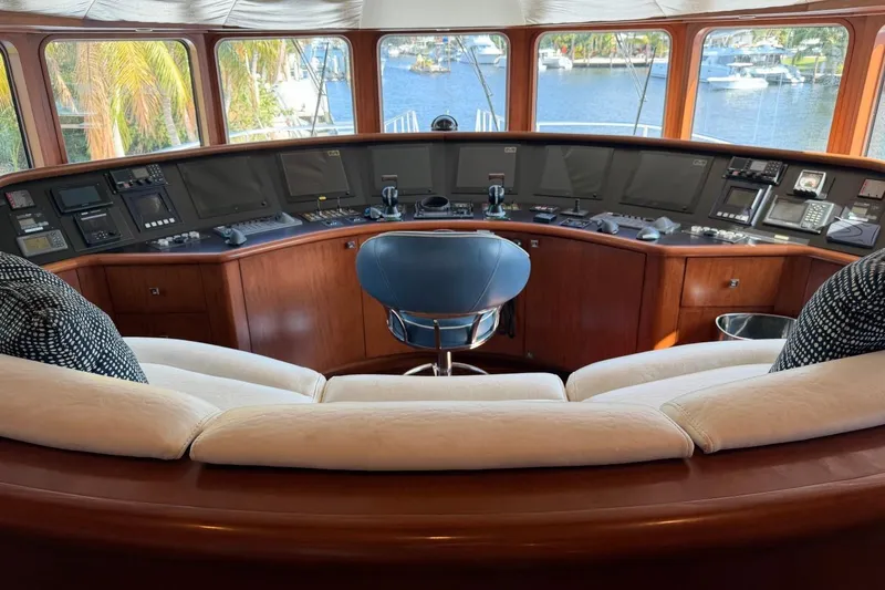 Slide: The Image of Luxurious Heesen 144 yacht helm with plush seating and panoramic windows, 1990 model. - 24