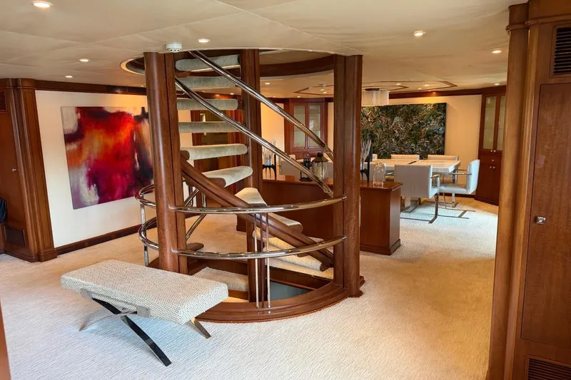 Slide: The Image of Luxurious interior of 1990 Heesen 144 yacht with spiral staircase and modern decor. - 42