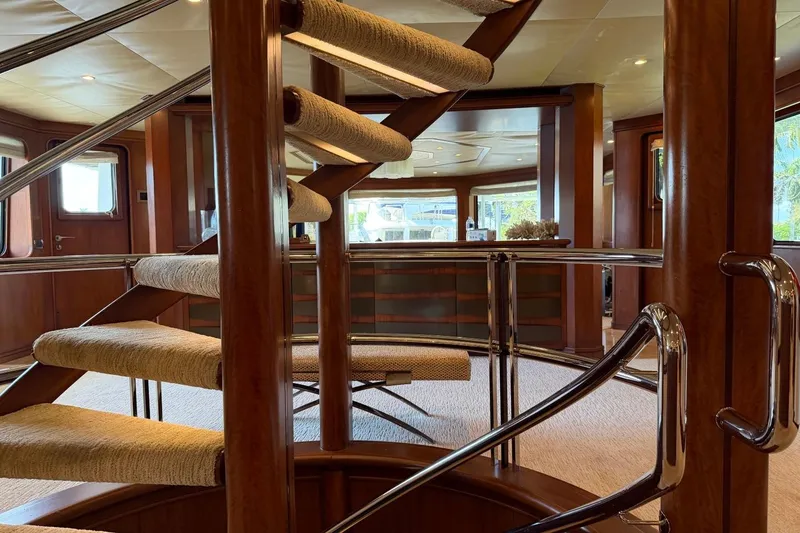 Slide: The Image of Luxurious interior of 1990 Heesen 144 yacht with elegant spiral staircase. - 55