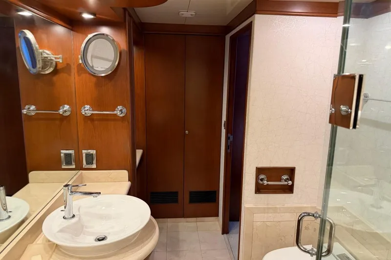 Slide: The Image of Luxurious bathroom interior of 1990 Heesen 144 yacht with wooden accents and modern fixtures. - 70