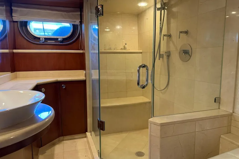 Slide: The Image of Luxurious bathroom in 1990 Heesen 144 yacht with glass shower and elegant fixtures. - 81
