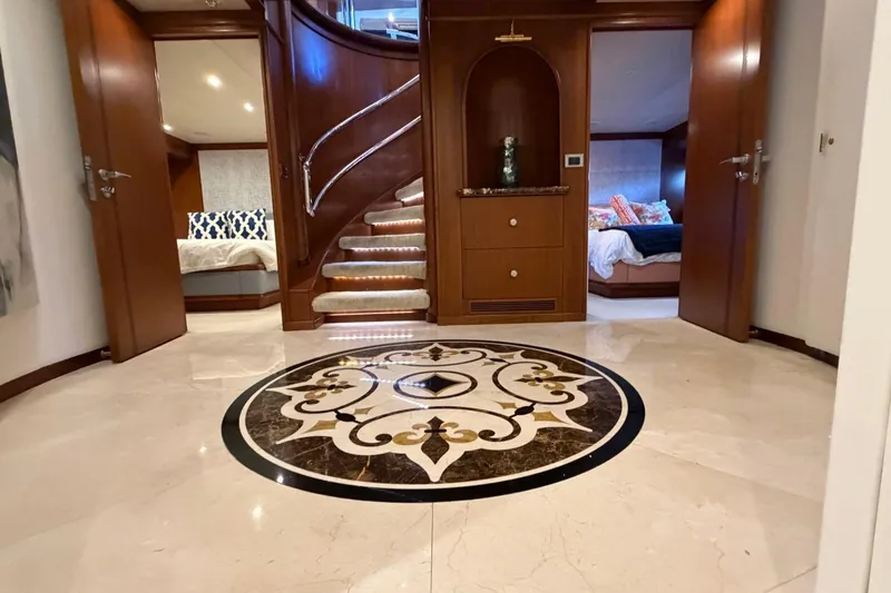 Slide: The Image of Luxurious interior of 1990 Heesen 144 yacht with elegant marble flooring and wooden accents. - 85