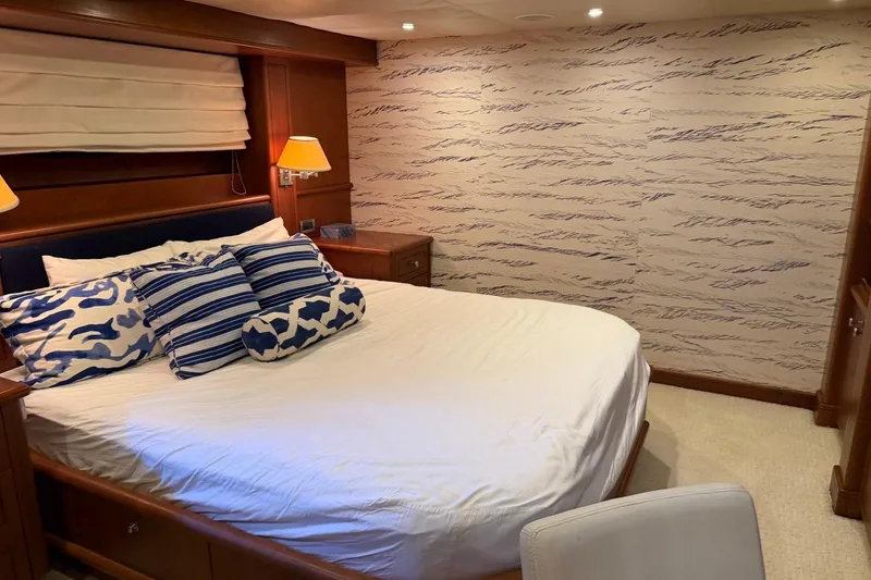 Slide: The Image of Luxurious bedroom interior on 1990 Heesen 144 yacht with elegant decor and cozy bedding. - 92
