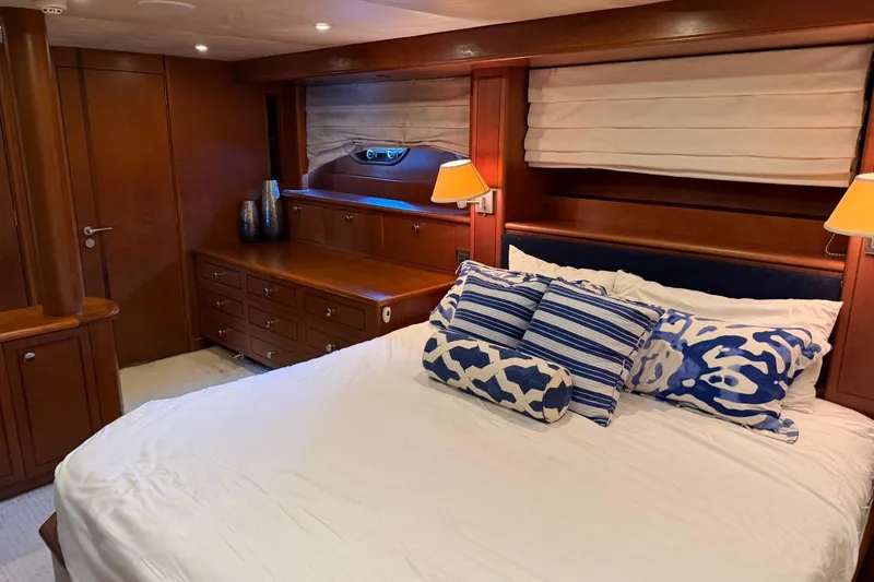 Slide: The Image of Luxurious bedroom interior on 1990 Heesen 144 yacht with elegant wood finish and stylish decor. - 93