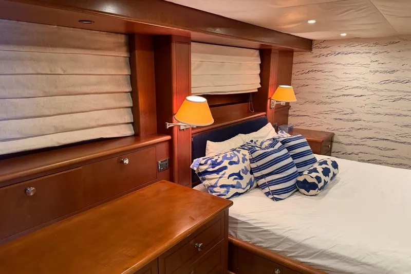 Slide: The Image of Luxurious bedroom interior on 1990 Heesen 144 yacht with elegant wood finish and stylish decor. - 95