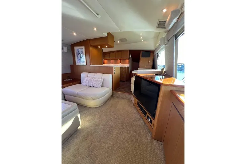 Slide: The Image of Luxurious interior of 2002 Ocean Yachts 56 Super Sport with plush seating and modern amenities. - 2