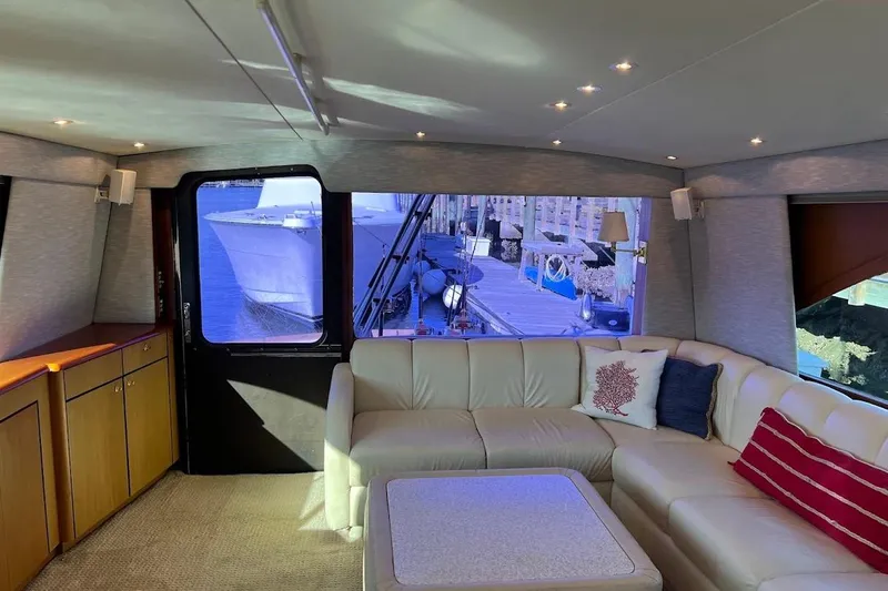 Slide: The Image of Luxurious interior of 2002 Ocean Yachts 56 Super Sport with plush seating and elegant decor. - 4