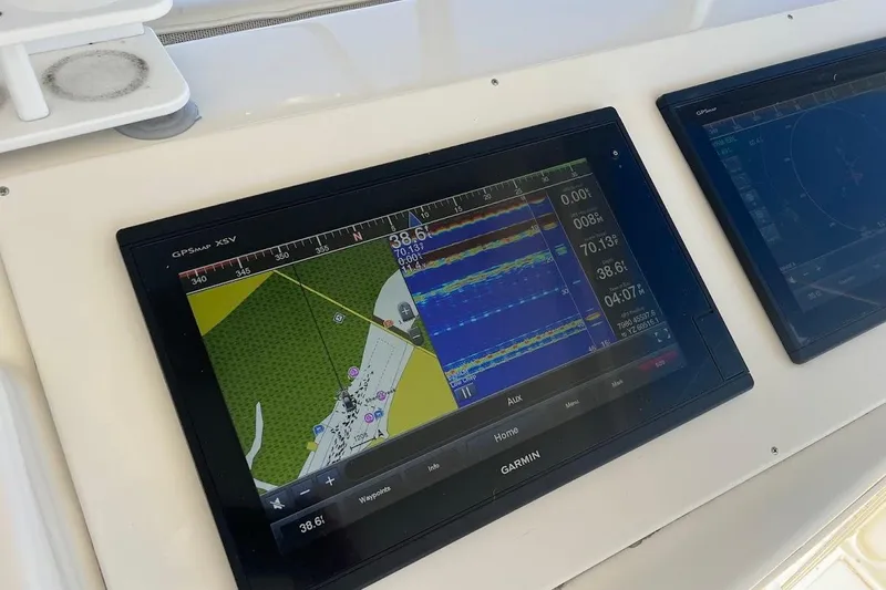 Slide: The Image of Garmin GPS display on 2002 Ocean Yachts 56 Super Sport boat dashboard. - 40