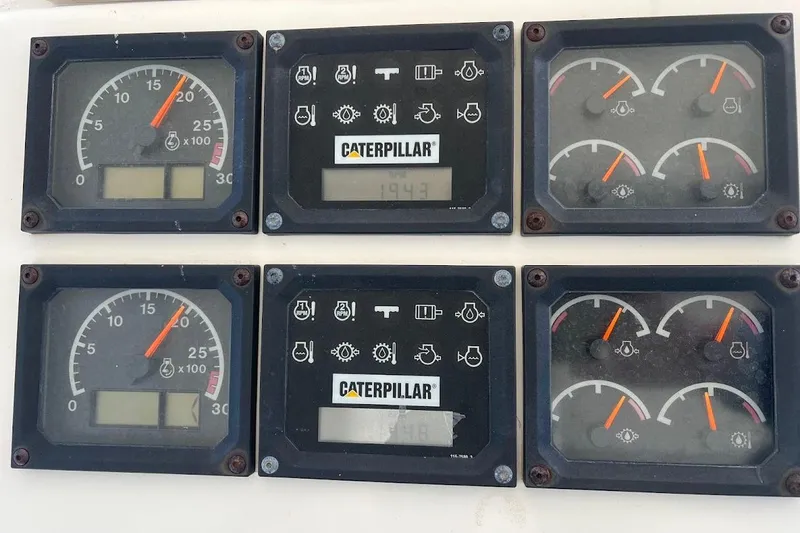 Slide: The Image of Instrument panel of a 2002 Ocean Yachts 56 Super Sport with Caterpillar gauges. - 45