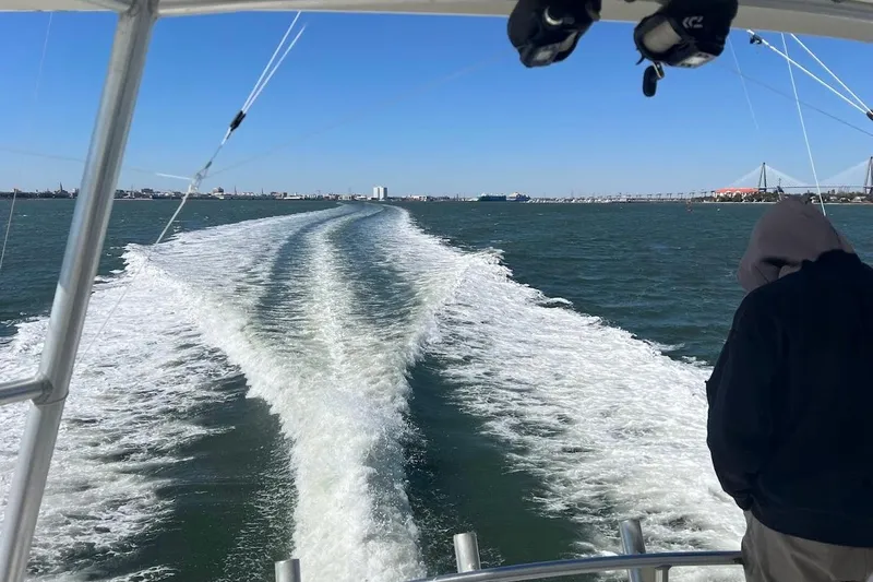 Slide: The Image of Wake of 2002 Ocean Yachts 56 Super Sport cruising on open water. - 47