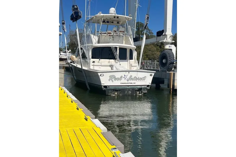 Slide: The Image of 2002 Ocean Yachts 56 Super Sport docked at marina, Charleston, SC. - 49
