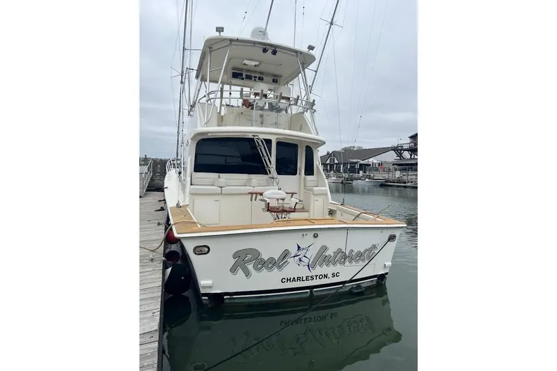 Slide: The Image of 2002 Ocean Yachts 56 Super Sport docked in Charleston, SC marina. - 85