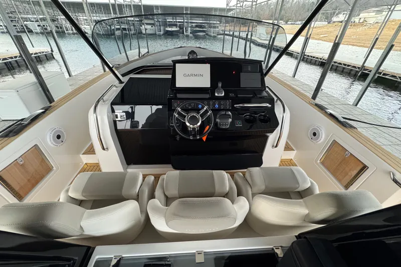 Slide: The Image of 2025 Pardo Yachts P38 cockpit with modern navigation system and luxurious seating. - 13