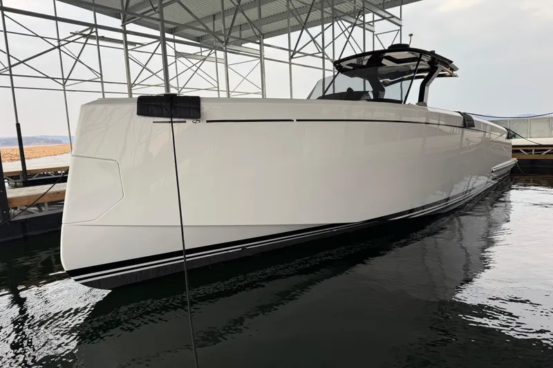 Slide: The Image of 2025 Pardo Yachts P38 in dock, sleek design, modern luxury yacht. - 2