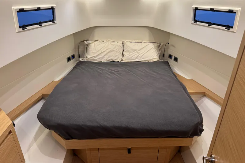 Slide: The Image of Interior cabin of 2025 Pardo Yachts P38, featuring a cozy bed and modern design. - 23