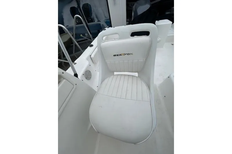 Slide: The Image of White seat on 2005 Sea Fox 230 Walk Around boat deck. - 21