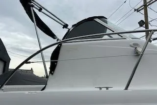 Slide: The Image of 2005 Sea Fox 230 Walk Around boat on trailer, side view. - 3