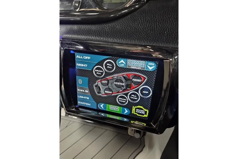 Slide: The Image of Touchscreen control panel in a 2013 Malibu Wakesetter 22 MXZ boat dashboard. - 9