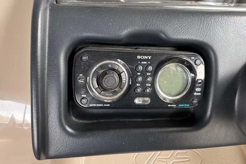 Slide: The Image of Sony marine stereo system on 2010 Harris Grand Mariner 250 boat dashboard. - 23